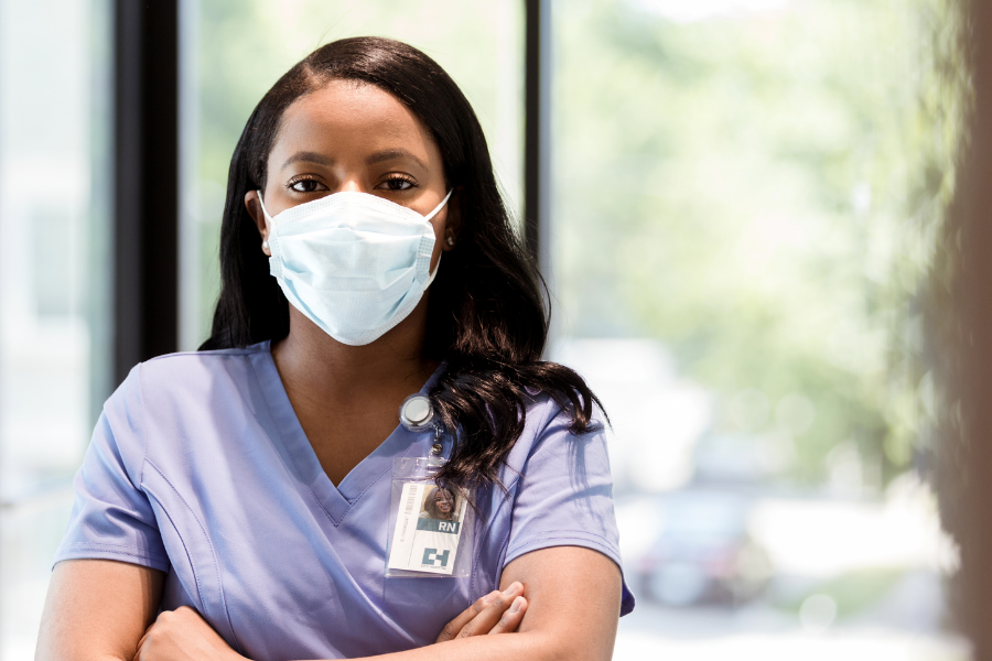 A nurse with protective mask on
